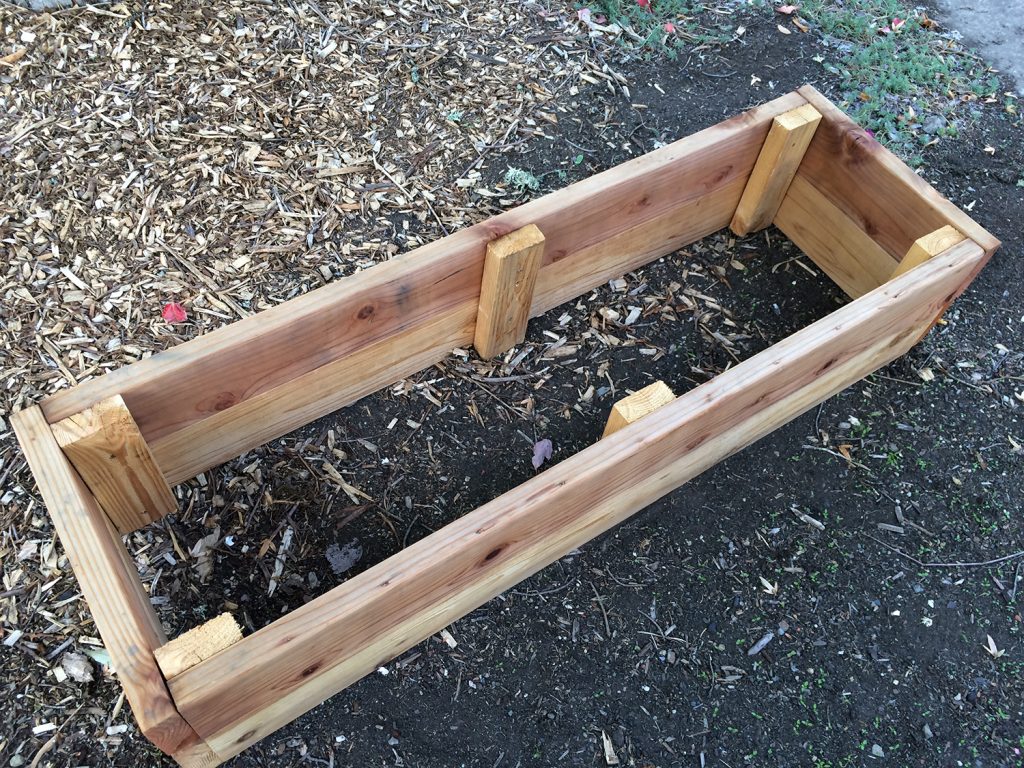 Raised beds are most often made of wood. Be sure to avoid lumber treated with chemicals.