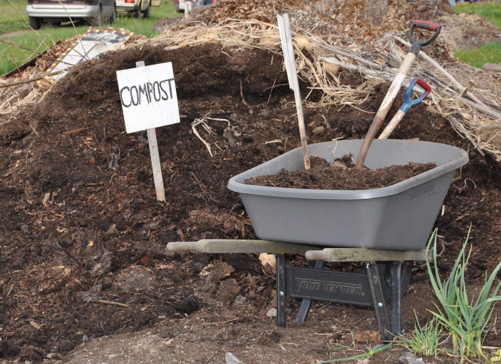 adding-compost-improves-soil-s-texture-and-adds-nutrients-plant